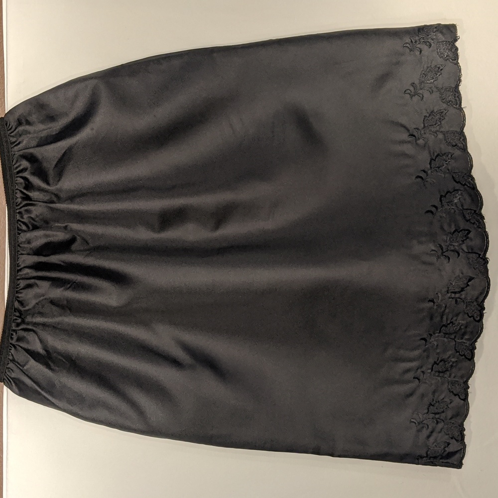 Vintage black half slip with floral embroidered hem